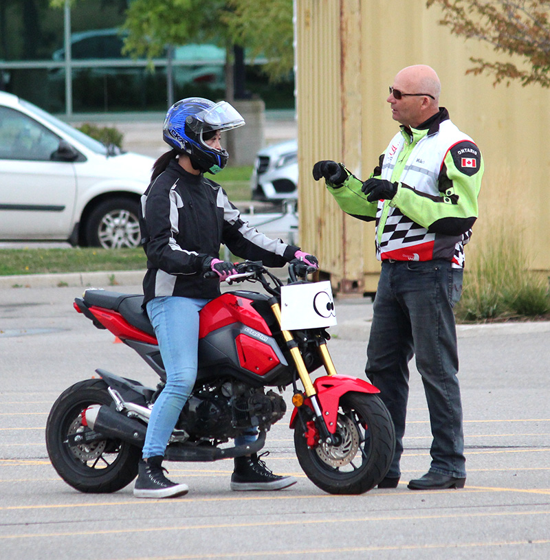 Instructor giving a student instruction